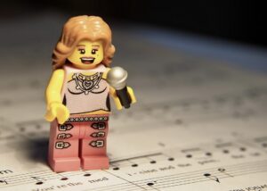 A singing LEGO figurine - Photo credit Ralf1403, Pixabay