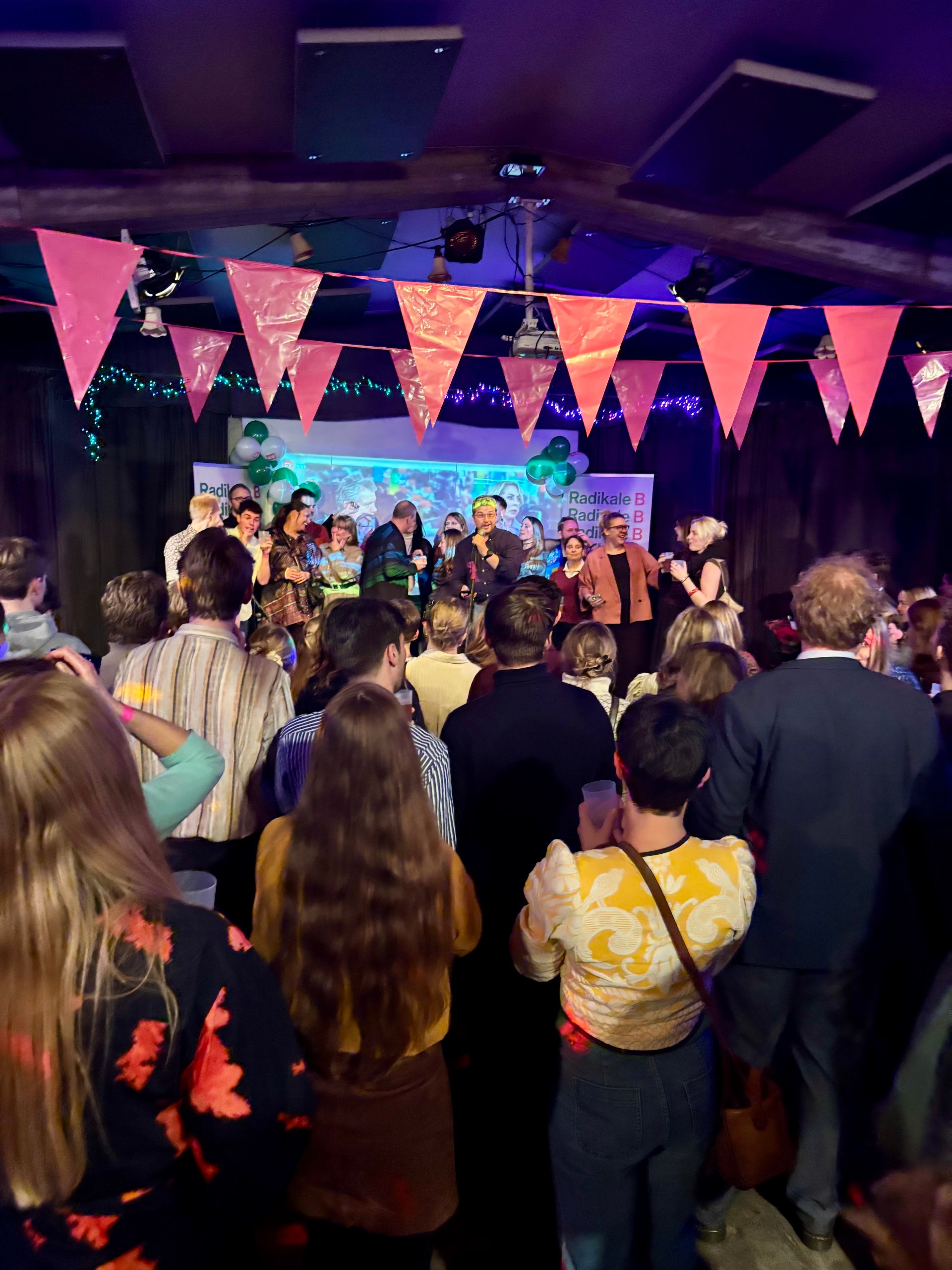 A room of people having a party