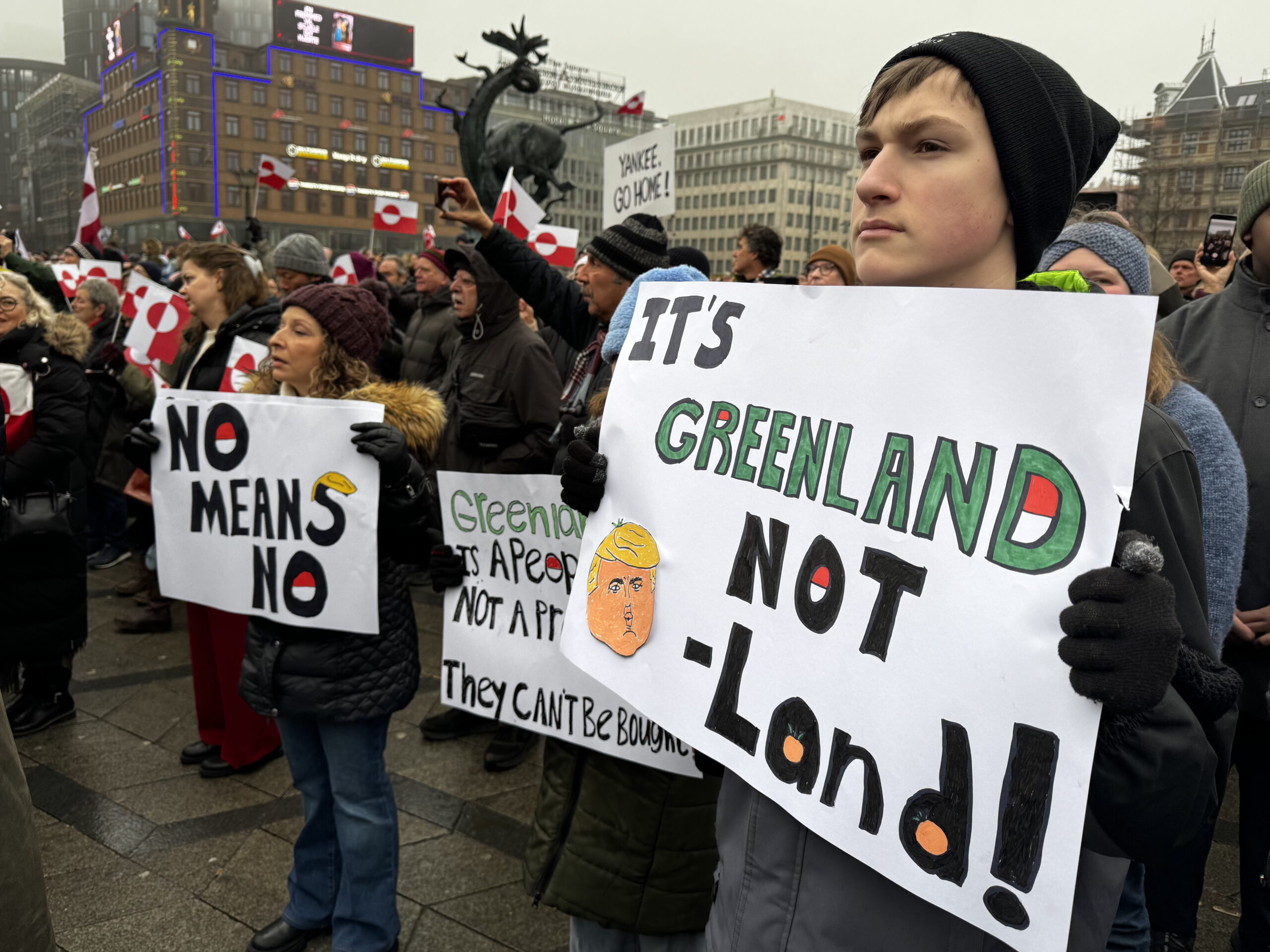 People standing with posters protesting
