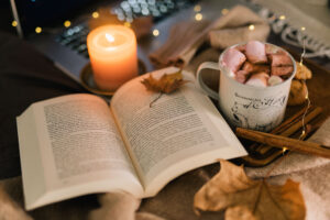 Candles and books on a table